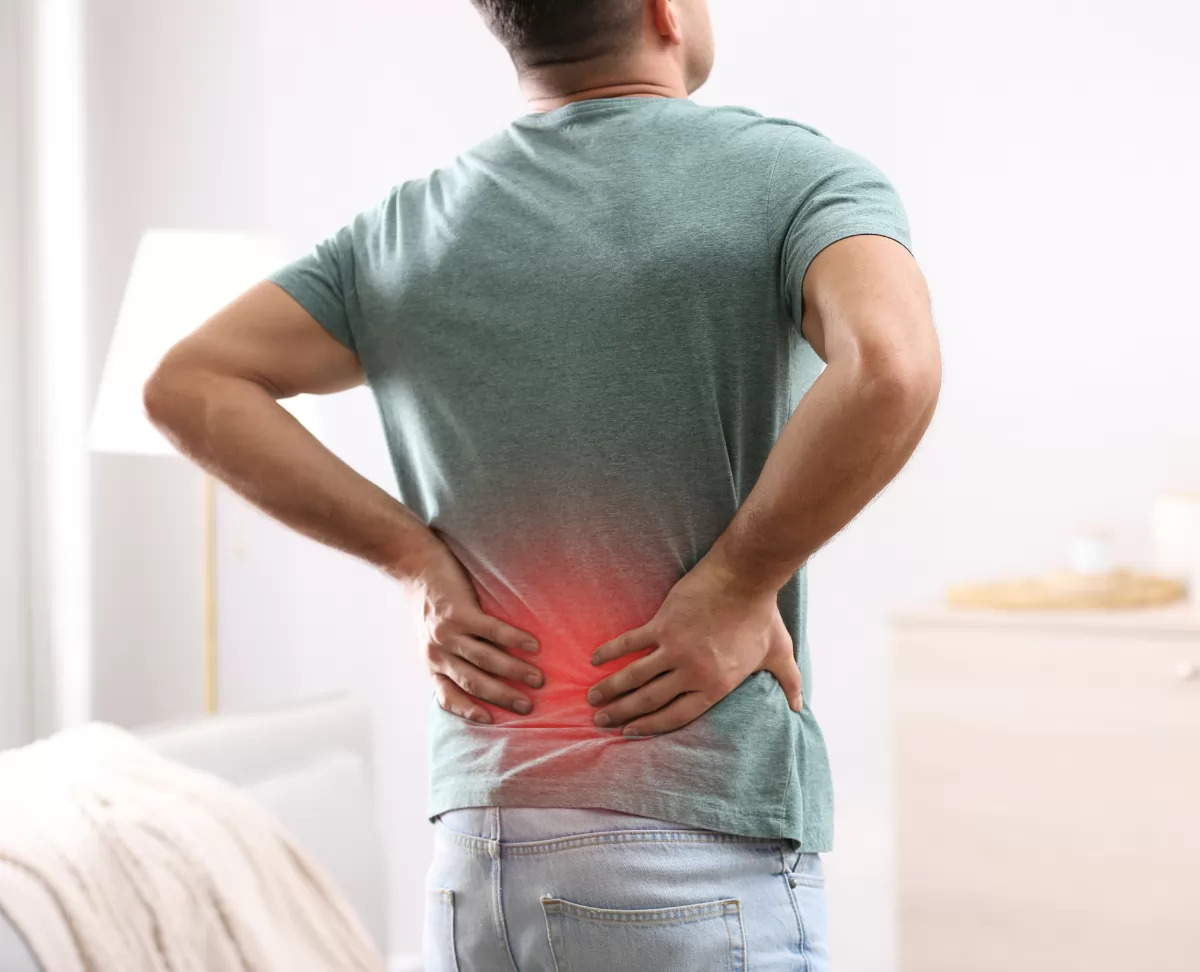 A man suffering from back Pain.
